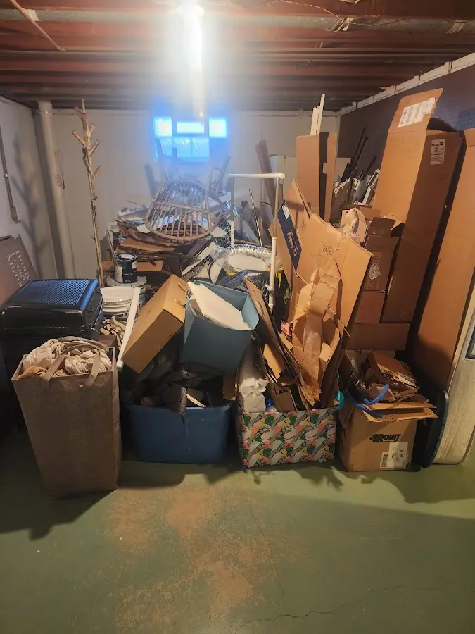 Roll-off dumpster container at job site for 6 Yard Dumpster Rental in Grantham